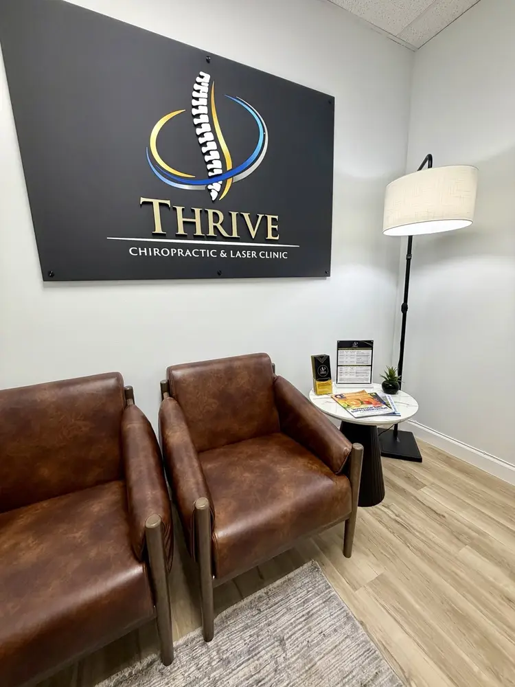 Reception area with the illuminated Thrive sign
